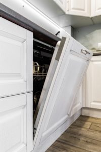 slightly open dishwasher - Homebiotic - 5 carcinogens in cleaning products